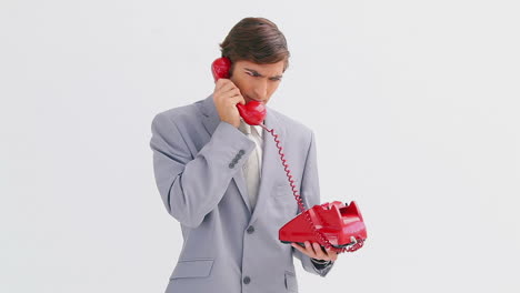 Serious-businessman-talking-on-the-phone