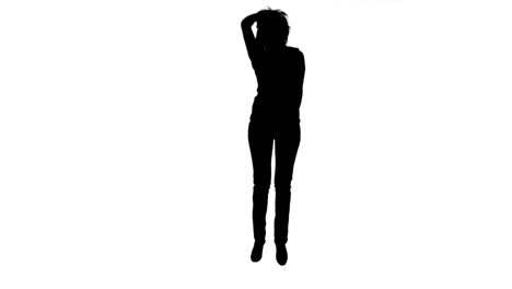 Silhouette-woman-jumping-in-slow-motion