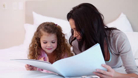 Woman-reading-a-story-for-her-daughter