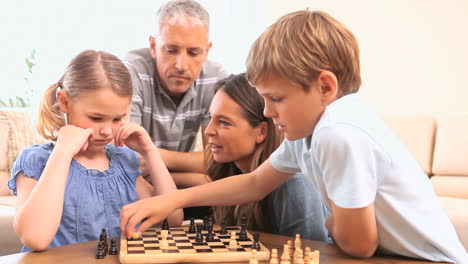 Siblings-playing-chess