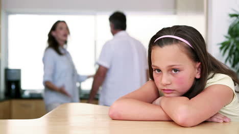 Little-girl-listening-to-her-parents-quarreling