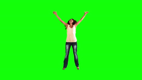 Woman-jumping-in-slow-motion-while-doing-a-star-jump