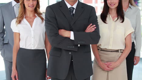 Standing-business-people-posing