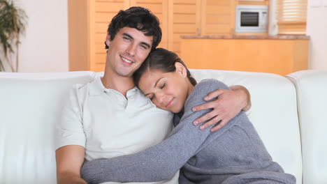 Couple-sitting-together-on-a-couch