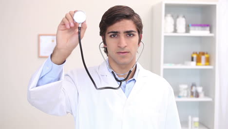 A-doctor-raising-a-stethoscope-