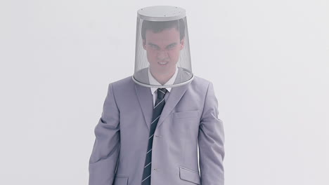 Angry-man-placing-a-bin-on-his-head