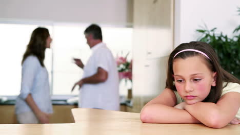 Child-listening-to-her-parents-quarreling