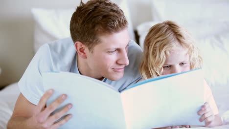 Father-reading-a-book-with-his-son