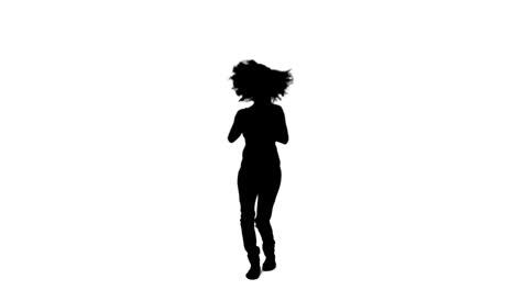 Silhouette-of-an-excited-woman-dancing