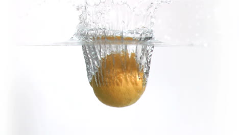 Lemon-falling-into-water-in-super-slow-motion