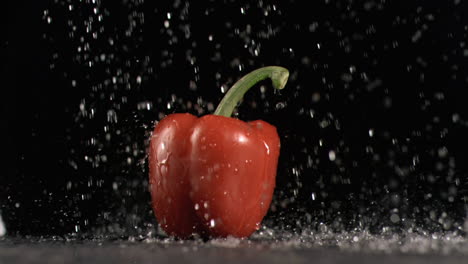 Water-raining-on-pepper-in-super-slow-motion