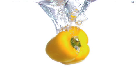 Pepper-submerged-into-water-in-super-slow-motion
