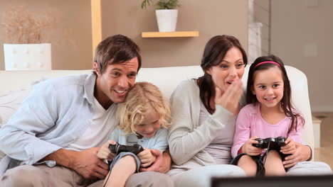 Happy-siblings-playing-video-games