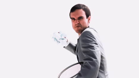Businessman-throwing-a-paper-ball-in-slow-motion