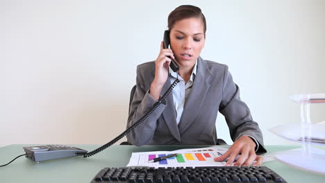 Serious-businesswoman-talking-on-the-phone