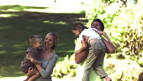 Parents-in-slow-motion-holding-their-children