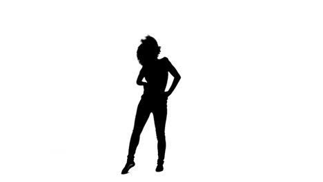 Silhouette-of-a-energetic-woman-dancing-