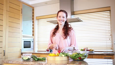 Young-woman-cutting-peppers