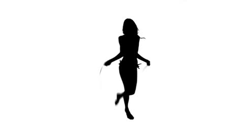 Silhouette-of-a-woman-using-a-skipping-rope