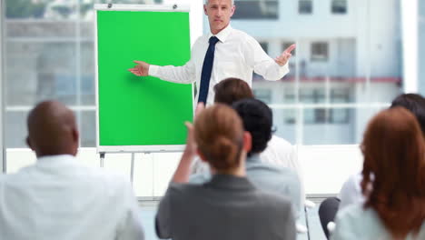 Man-showing-with-the-board-with-his-hand