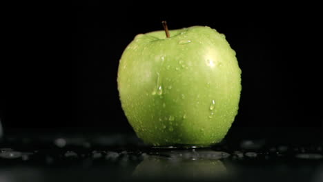 Water-running-down-an-apple-in-super-slow-motion