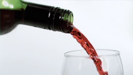 Red-wine-being-poured-in-super-slow-motion