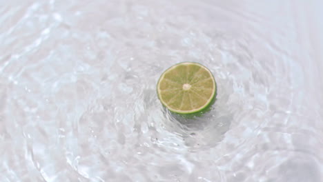 Lemon-turning-in-water-in-super-slow-motion