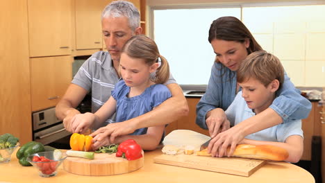 Smiling-family-cooking-together