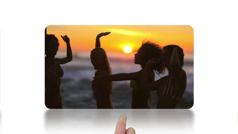 Finger-scrolling-screens-which-are-showing-beach-videos