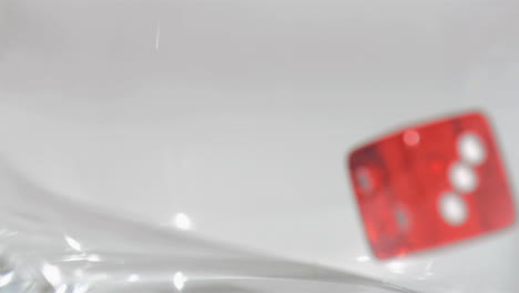 Pair-of-red-dice-in-super-slow-motion-falling