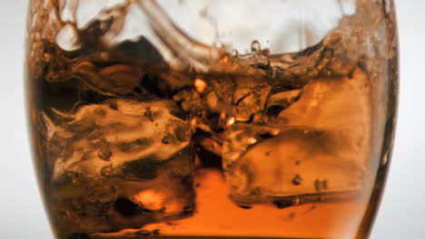 Ice-cubes-in-super-slow-motion-falling-in-a-glass