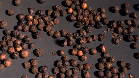 Brown-peppercorns-falling-in-super-slow-motion