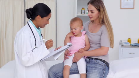 Doctor-asking-question-about-a-baby