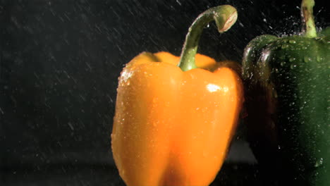 Raindrops-in-super-slow-motion-falling-on-peppers