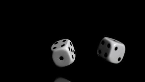Two-white-dices-in-super-slow-motion-rebonding-