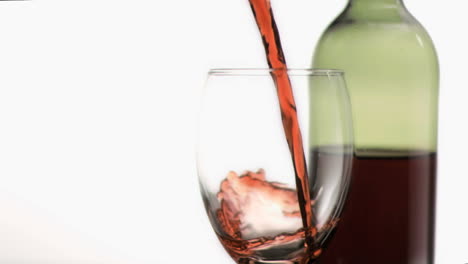 Red-wine-poured-in-super-slow-motion-into-a-glass