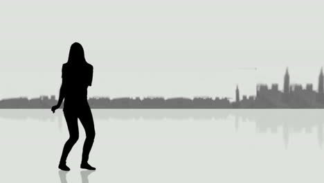 Woman-dancing-next-to-a-screen