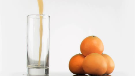 Orange-juice-splashing-in-super-slow-motion