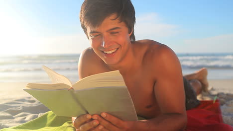 Handsome-man-reading-a-novel