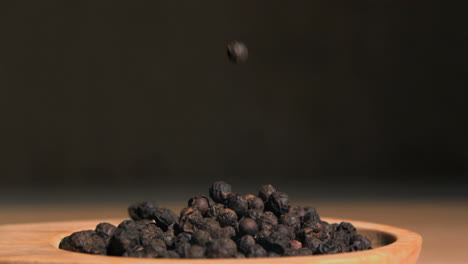 Black-peppercorns-falling-in-super-slow-motion