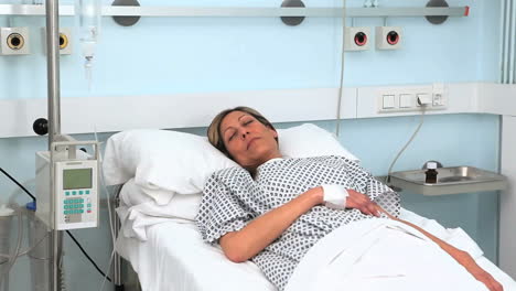 Female-patient-asleep-on-a-medical-bed-