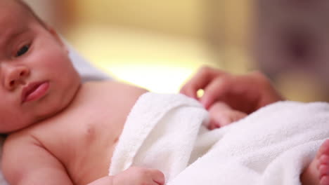 Woman-standing-on-top-of-a-new-born-baby