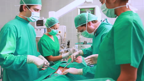 Surgeons-operating-a-patient-belly