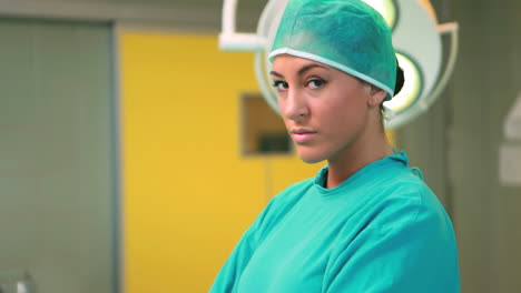 Nurse-looking-at-camera-while-wearing-a-surgical-equipment