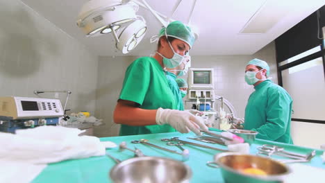Side-view-of-a-medical-team-operating