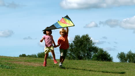 Little-boy-and-little-girl-running-with-kite