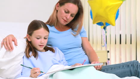 Mother-with-her-daughter-in-a-hospital-ward