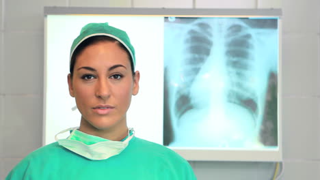 Female-doctor-looking-at-xrays-