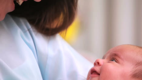 Woman-holding-a-baby-boy