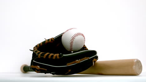 Baseball-falling-in-baseball-gloves